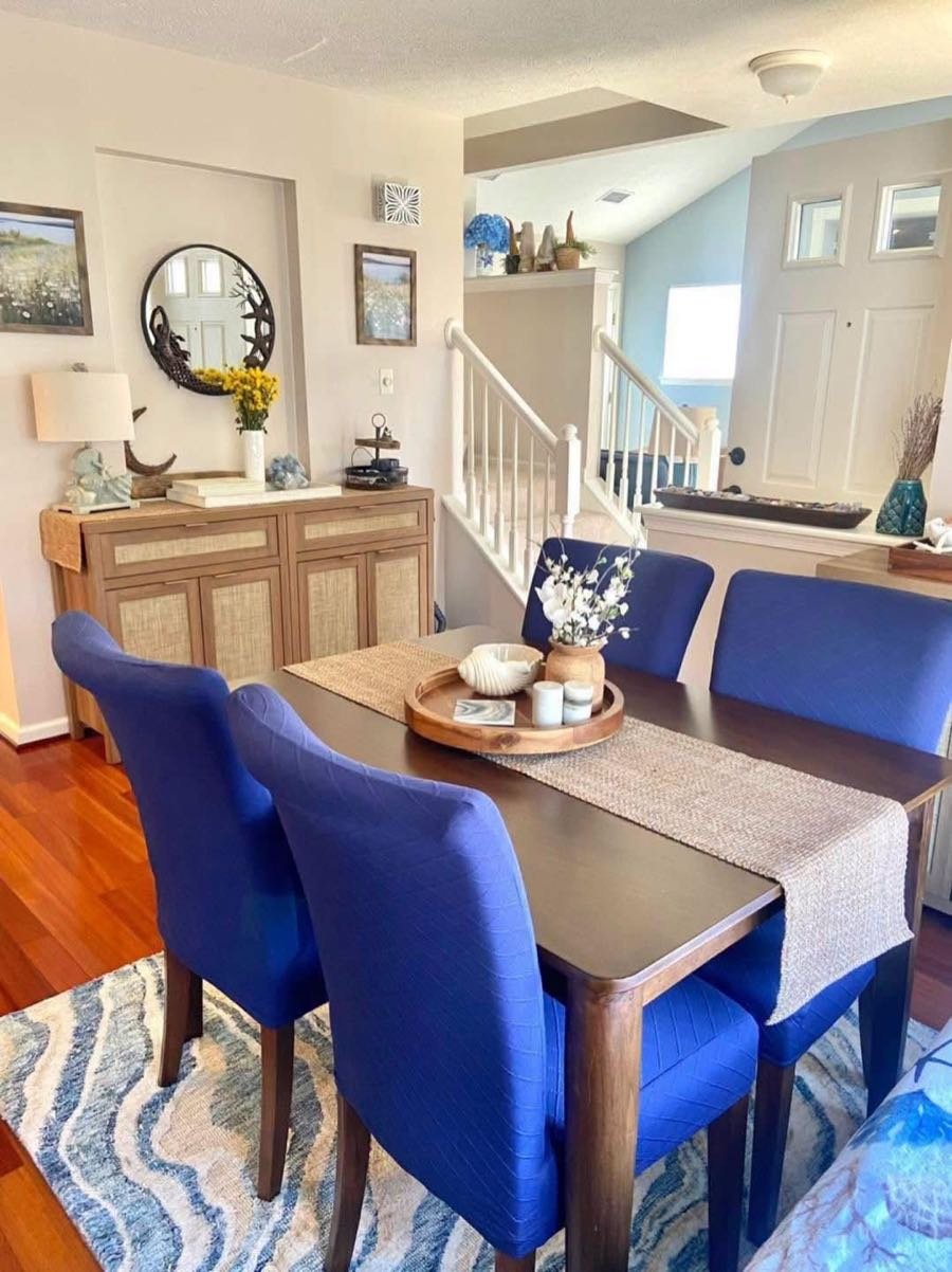 Dining room with a dark wood table and blue chairs