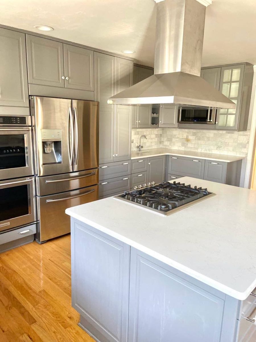 Gray kitchen with stainless steel appliances